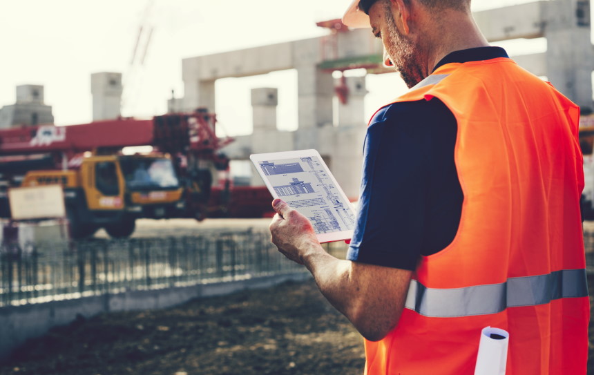 A construction technology worker using electronic form