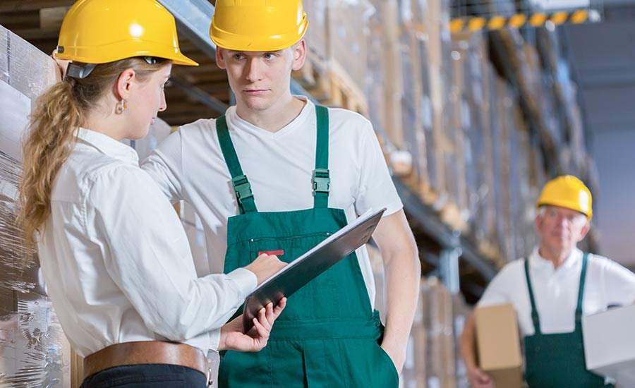 An image showing a manager talking to an employee