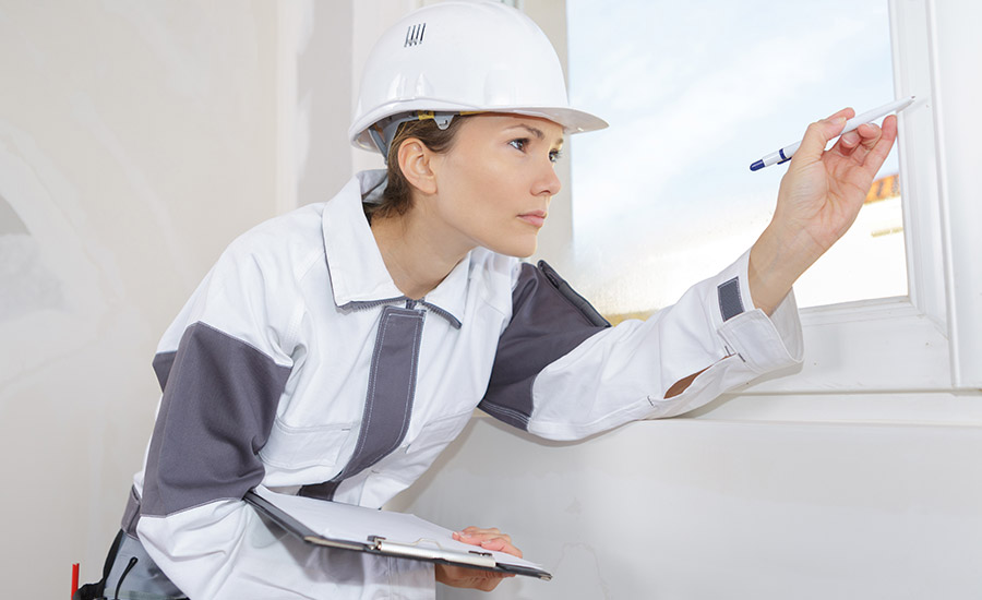 A female engineer checking the windows